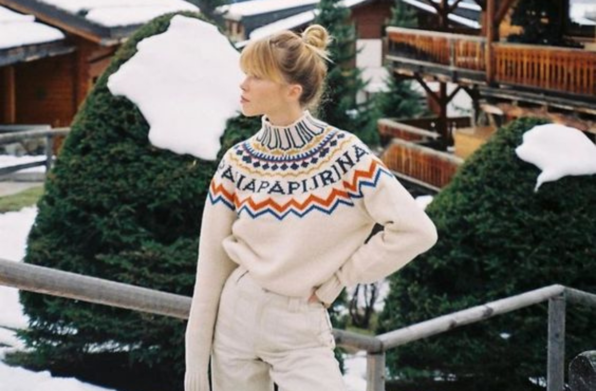 blonde women wearing beige turtleneck in the snow