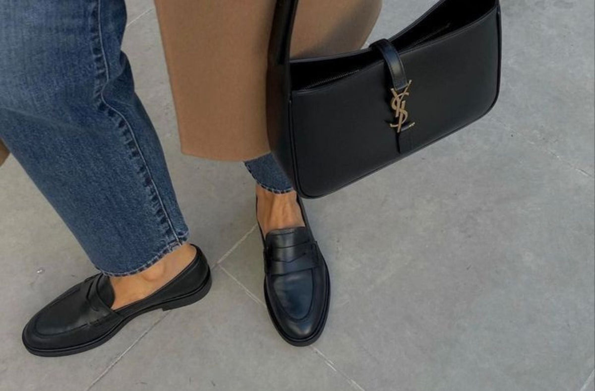 women wearing leather black loafers for walking