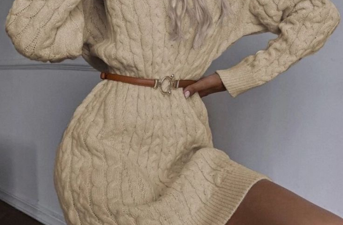 women wearing leather belt with beige cable knit sweater dress 