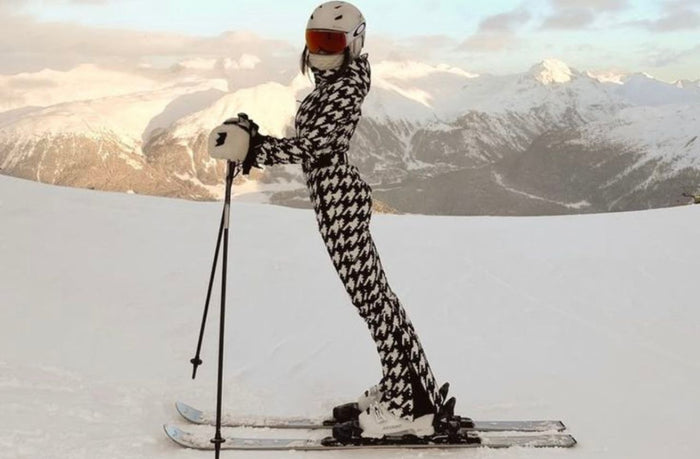 petite women wearing houndstouth ski outfit